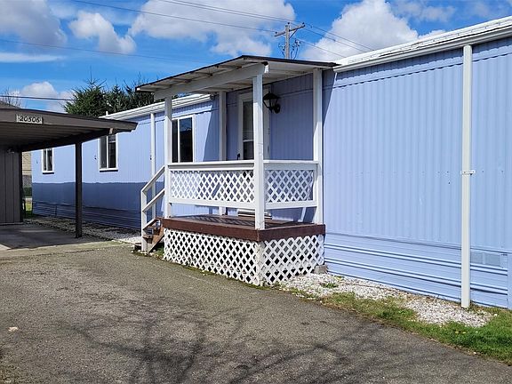 Carport and room for 2 additional vehicles>