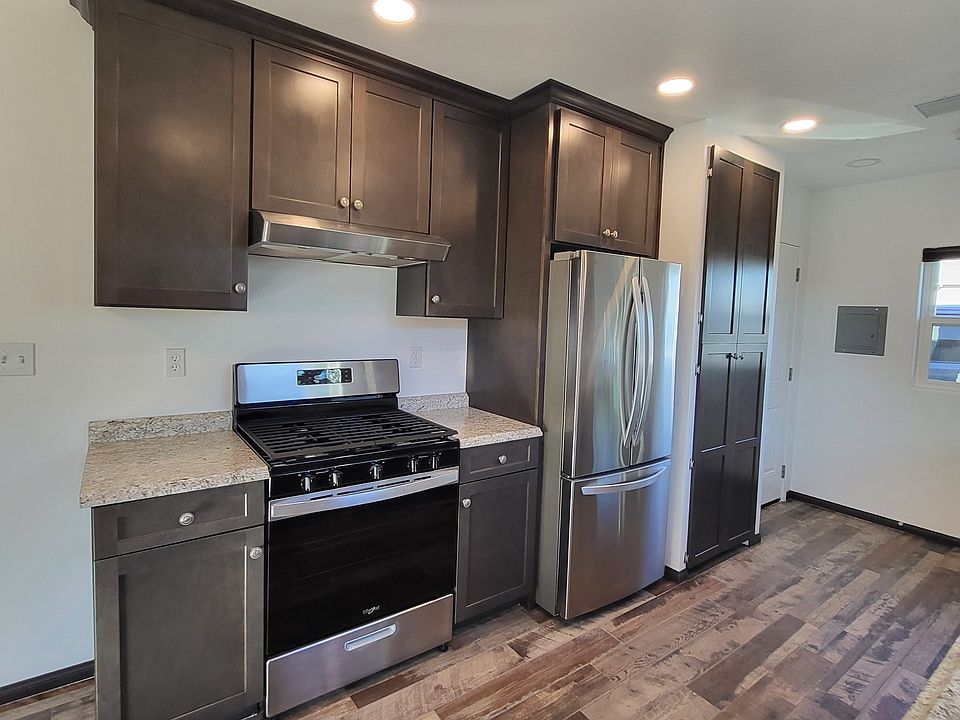 Beautiful new kitchen with all new appliances. Gas stove. Washer/Dryer in cabinet next to the refrigerator. Ample cupboards with tons of storage.