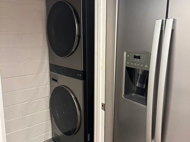 laundry in basement off kitchen
