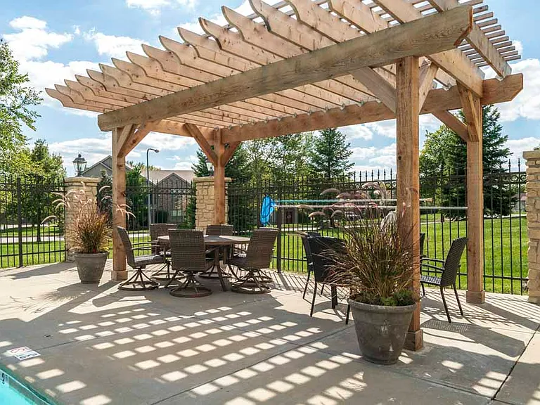 Our pergola offers the perfect amount of shade while hanging out by the pool.
