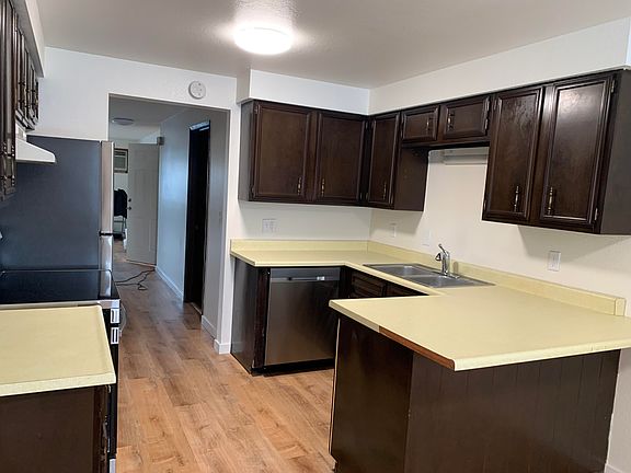 Kitchen with bar seating for 2 and room (not shown) for a kitchen table