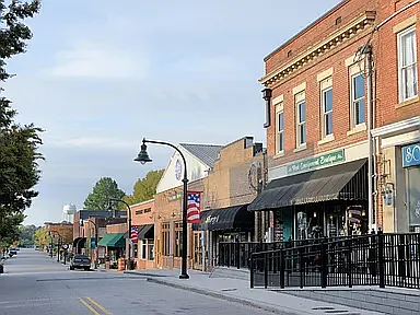 Stroll along White Street in the historic Downtown Wake Forest, where charming shops, local dining, and community events create a vibrant atmosphere.