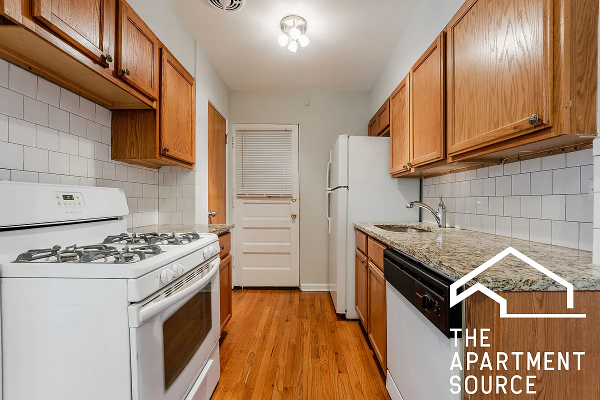 Building Photo - 6535 N Mozart St #1F