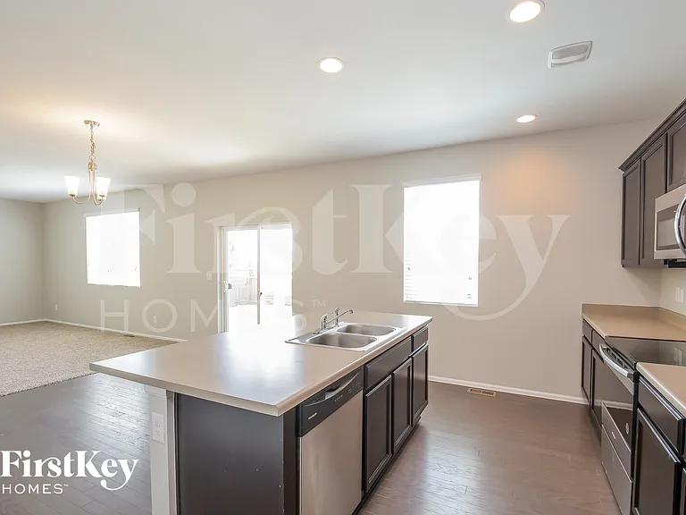 6481 N Dunkirk Ct — Photo 7