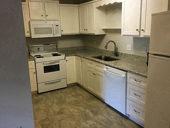 Granite Counters, Microwave, Stove, Fridge included