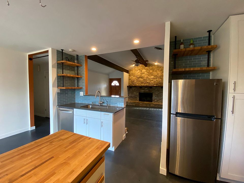 Kitchen view from cooktop/oven area