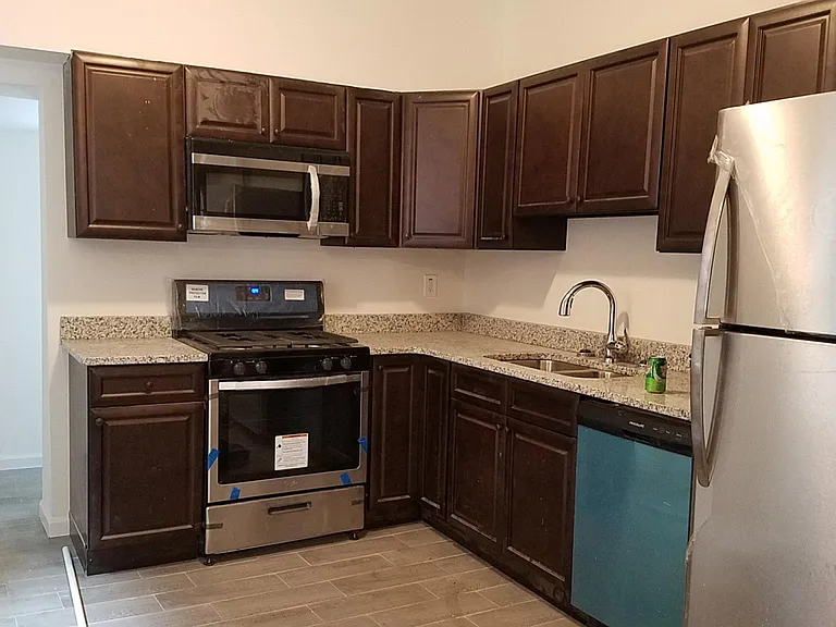 5557 Walton Ave — Photo 1