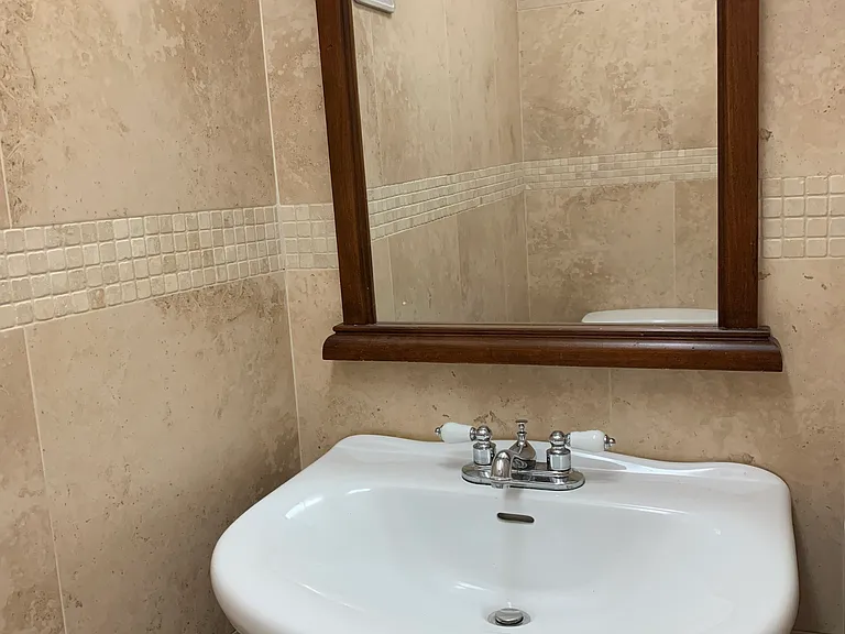 Convenient half-bathroom on the first floor.