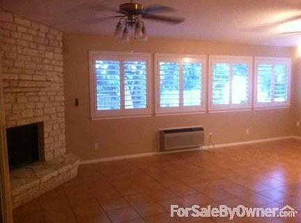 Gas fireplace in sunroom/great room
						:
						cozy up to this custom Austin stone gas powered fireplace, complete with remote