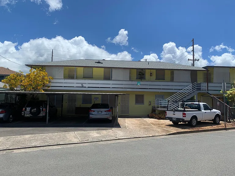 This is the front of the property. Those shade screens help prevent the afternoon sun from coming into your apartment and provide privacy during the day time. At dusk exterior lights automacially come on.