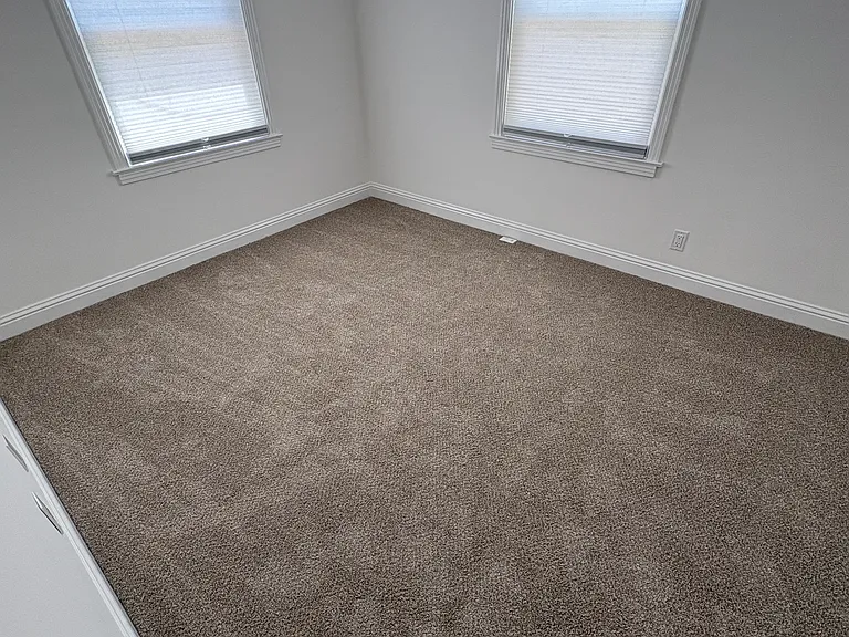 Rear bedroom, picture taken form entry door towards backyard