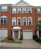Colonial style townhome warmly welcomes