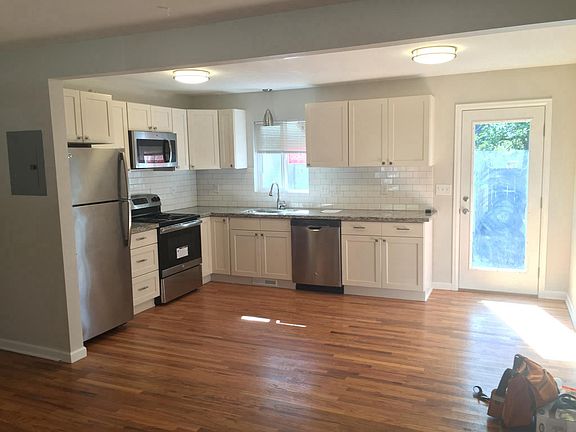 Kitchen opens to the back yard