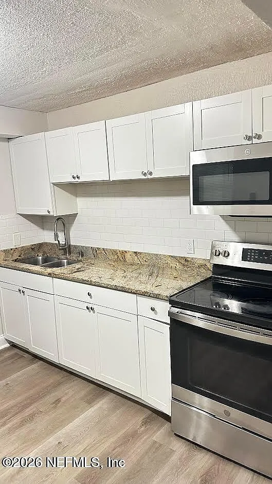8 bed, 2.5 bath, 676 sqft, $975 — Photo 4