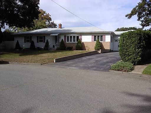 Main house w/ 2 garages
