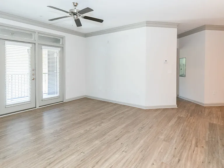 Living Room with Balcony and Hard Surface Flooring