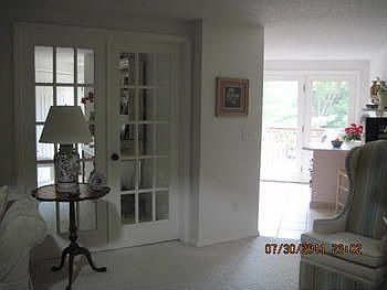 ENTER THE FORMAL DINING ROOM THRU FRENCH DOORS.