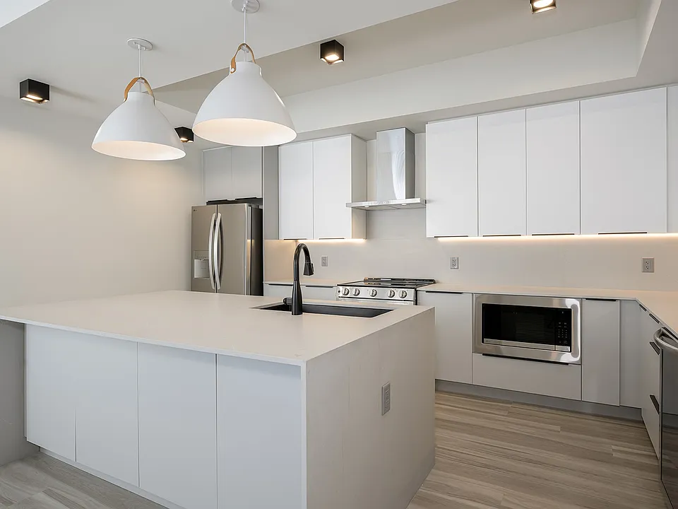 Quartz waterfall edge islands*