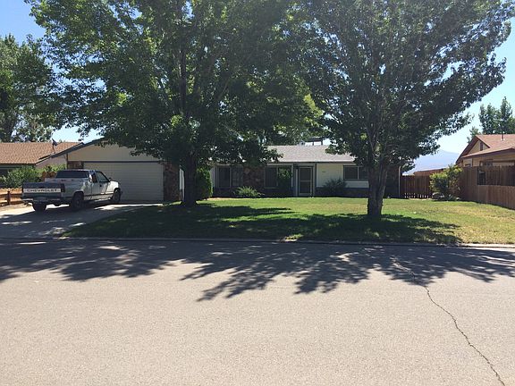 Huge front year with mountain views. Two car garage.
