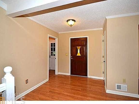 Rich hardwood floors welcome you into this beautifully renovated home with wide open floor plan!