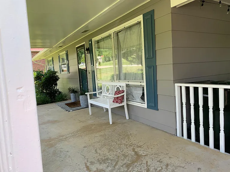 Front door & living room picture window.