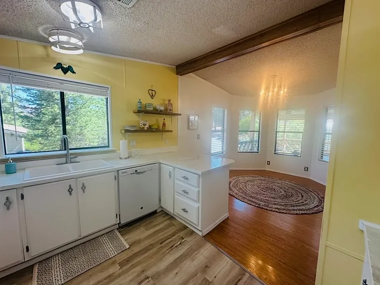View into large natural lite room. Great for an office, art room, breakfast nook.