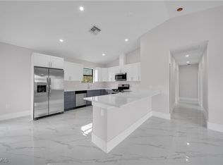 457 Woodman Dr, Lehigh Acres, FL 33972