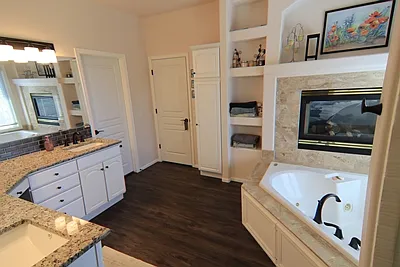 Primary Bath View- gas fireplace #2. Closet door to the left
