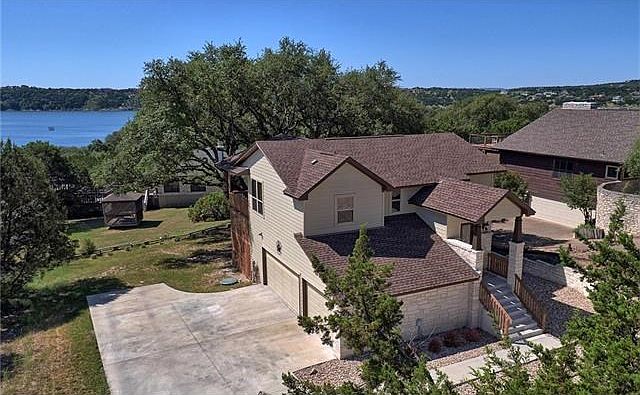 Aerial font of home view - not lakefront but very close to water and lakefront park, with fine lake views.