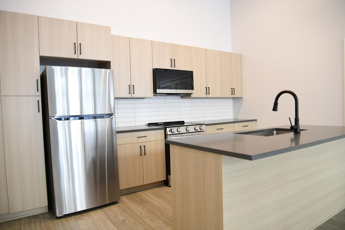 Modern Kitchen with wooden cabinetry