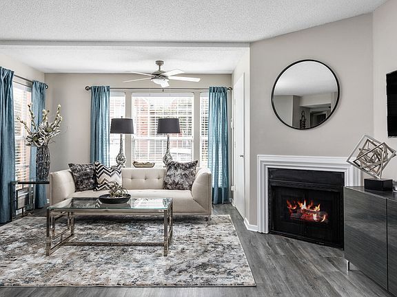 Spacious Living Room with Fireplace - Stonebridge Crossing