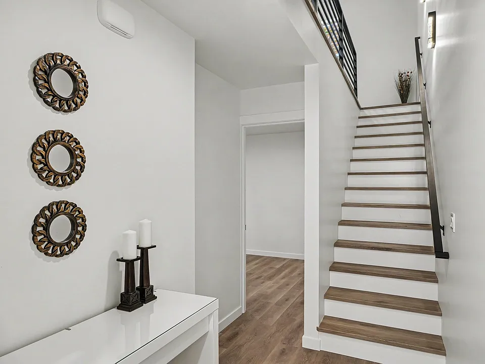 A beautiful front foyer with lots of space.