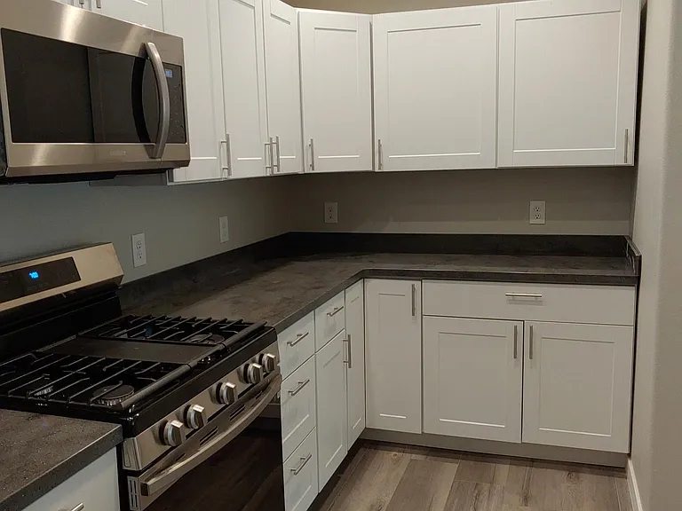 White Cabinets throughout, Grey Paint Theme.