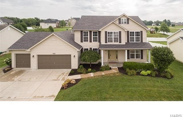 Dardenne Valley Drive is just waiting for you.  Builder chose this building site for his display due to the cul-de-sac location and backing to open common ground.  What a wonderful park-like setting.    Notice the carefully planned professional landscape.