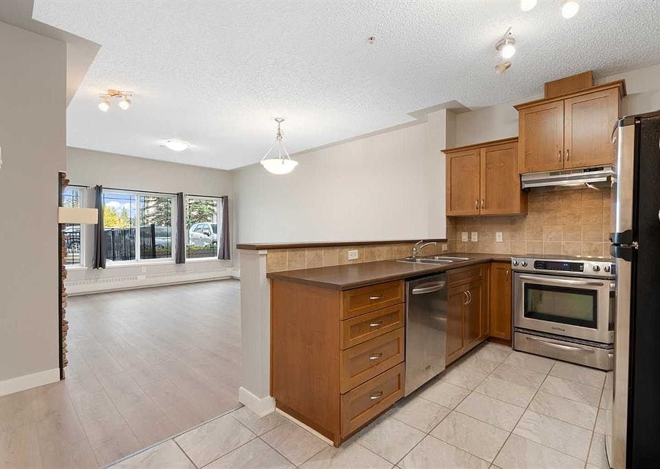 1st image of 20 E Discovery Ridge Close SW #101