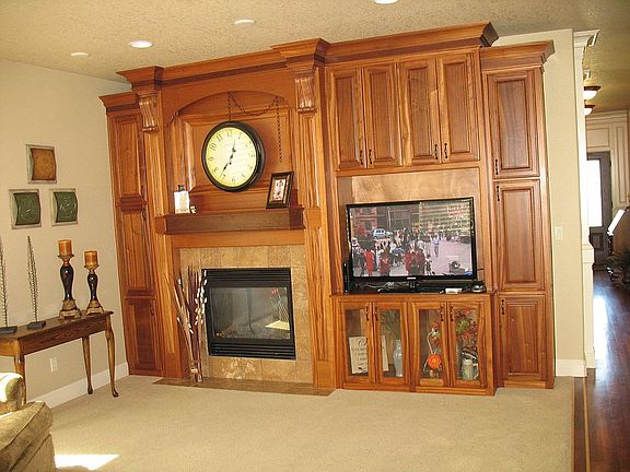 family room gas fire and bookcase/entertainment built in