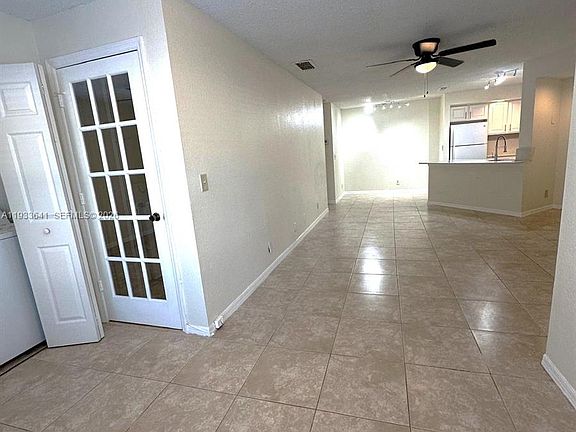 2nd image of 3420 Pinewalk Dr N APT 713