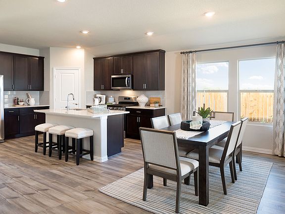 Enjoy home cooked meals together in the dining area.