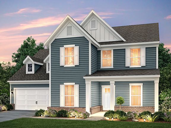 Northridge Exterior LC2G w siding, brick, front sitting porch and 2 car garage