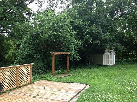 Back yard with deck and storage shed