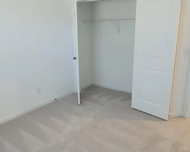 Closet within the second bedroom