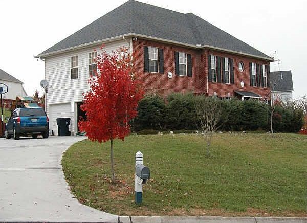 Three car Garage view of 11307 BarHarbor Way
