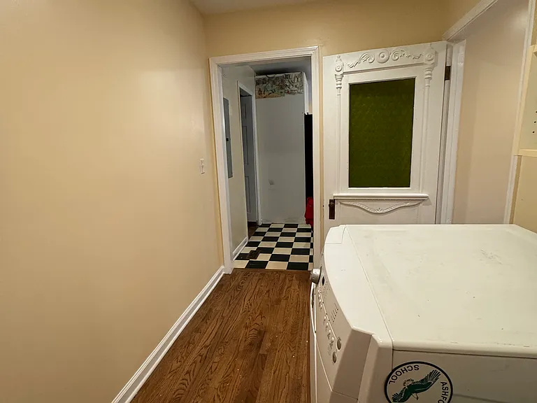 View of laundry room from side exterior door