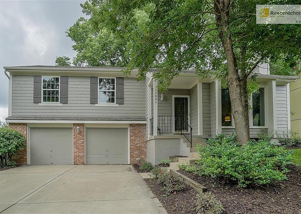 Brand new siding, shutters, windows, exterior paint and landscaping