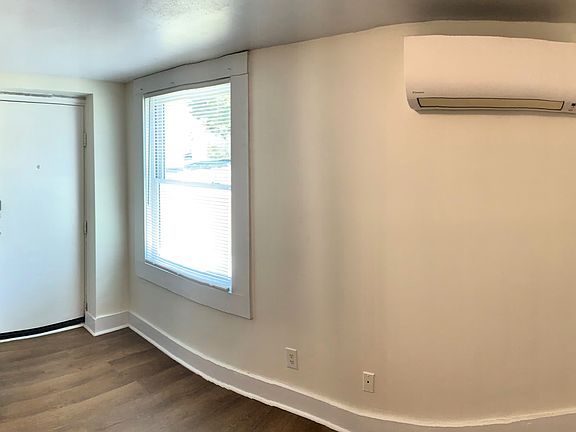 front door, kitchen, and side walls