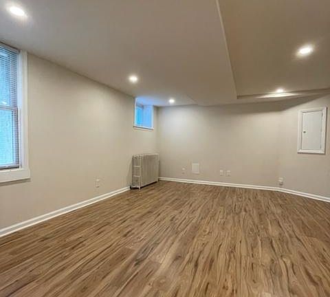 large bedroom with lots of natural light