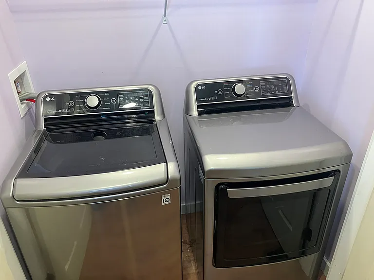 Washer and dryer in entry hallway