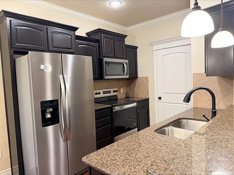 5702 NW Valor Ave — Photo 14