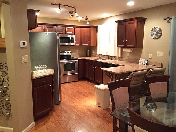 Oak floor & cherry cabinets