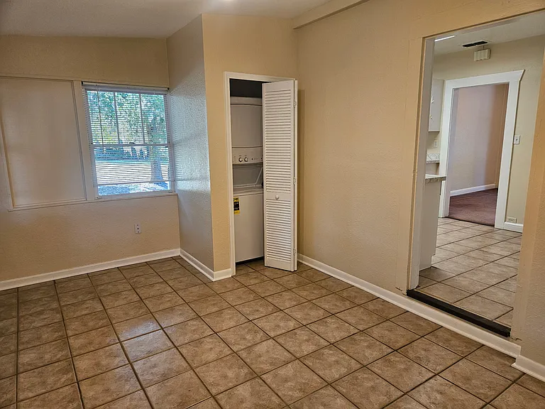 Den/dining with laundry